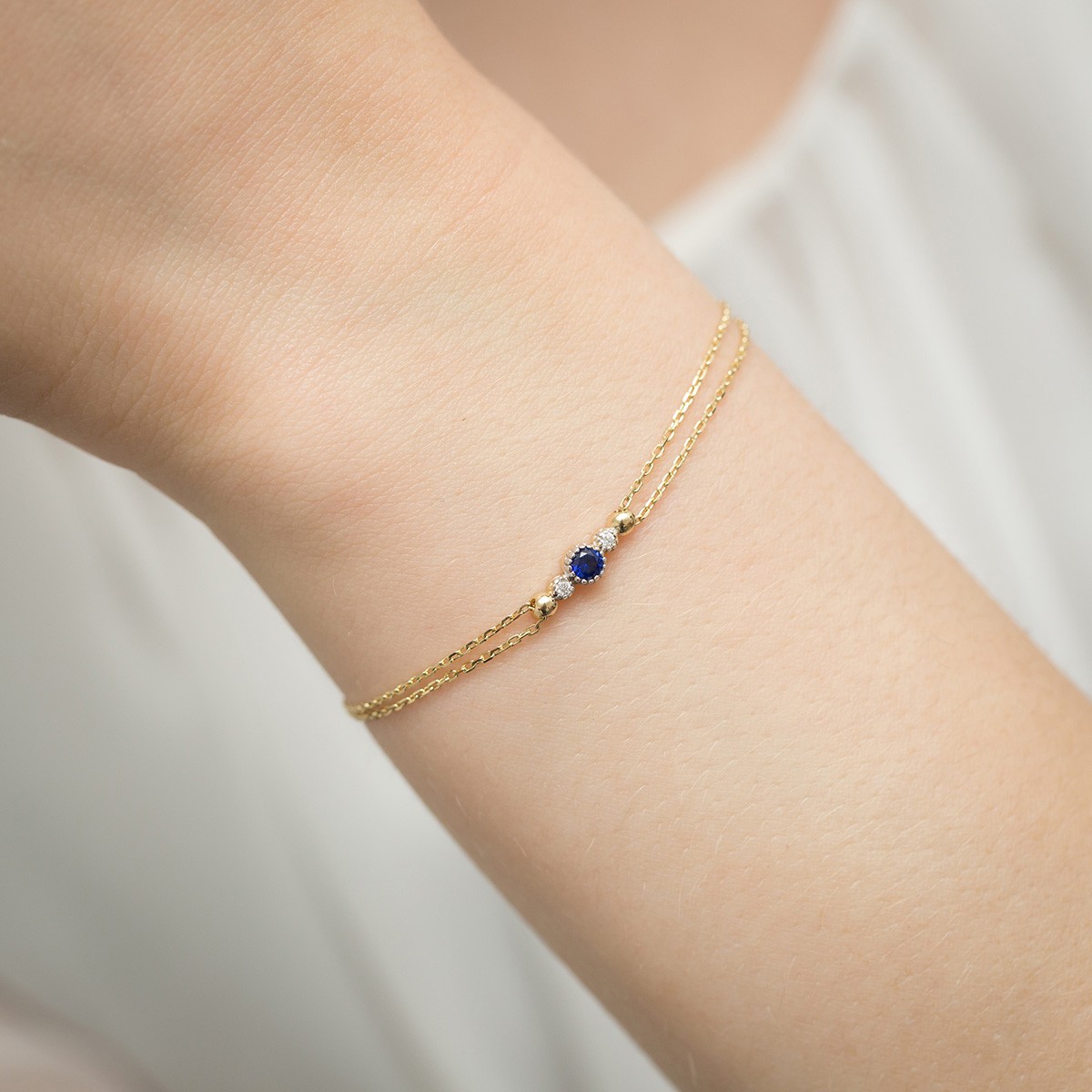 Złota bransoletka z diamentami i szafirem FB-005-585-S0.15/B0.03 3