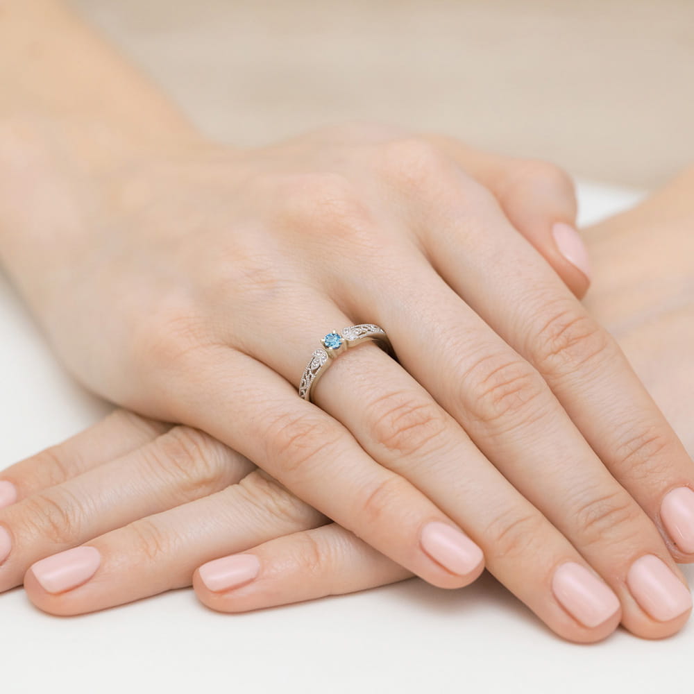 Pierścionek zaręczynowy z brylantami i topazem 0.03ct 1
